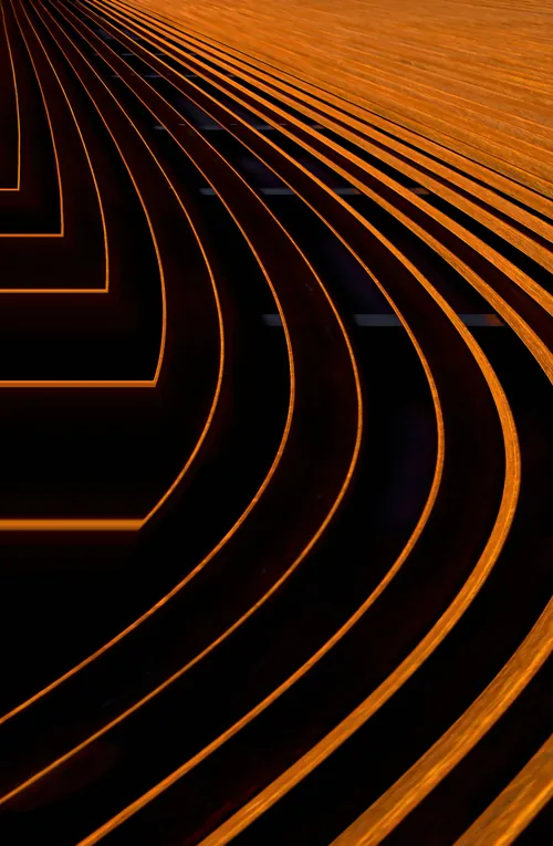 Curved lines of a wooden structure in orange and black